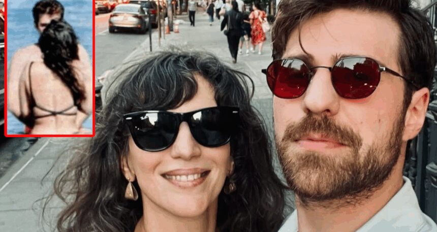 Plajdakilere aldırış etmeyen Nihal Yalçın sevgilisini öpücüklere boğdu