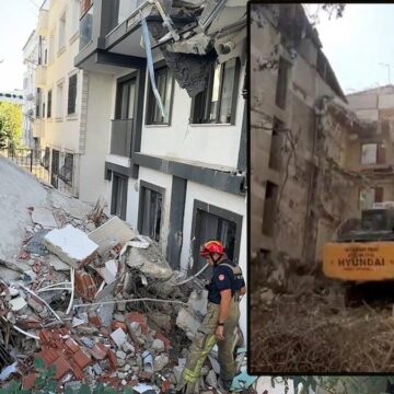 Devrilen binayı iş makinesiyle tutmaya çalıştılar