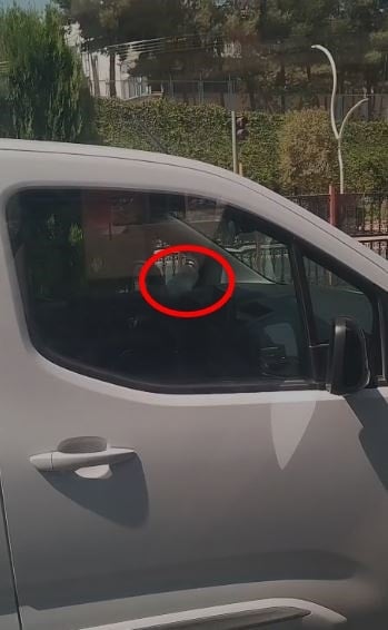 Trafik magandası bir ayağı cam kenarında araç kullandı!