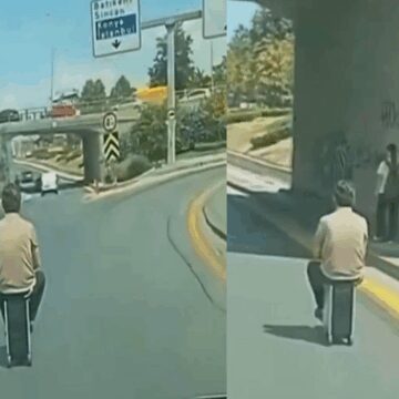Elektrikli skuterla akılalmaz yolculuk valizle bindi